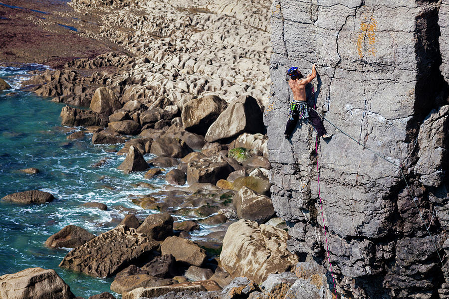 Climber On Coastal Cliffs Digital Art by Billy Stock