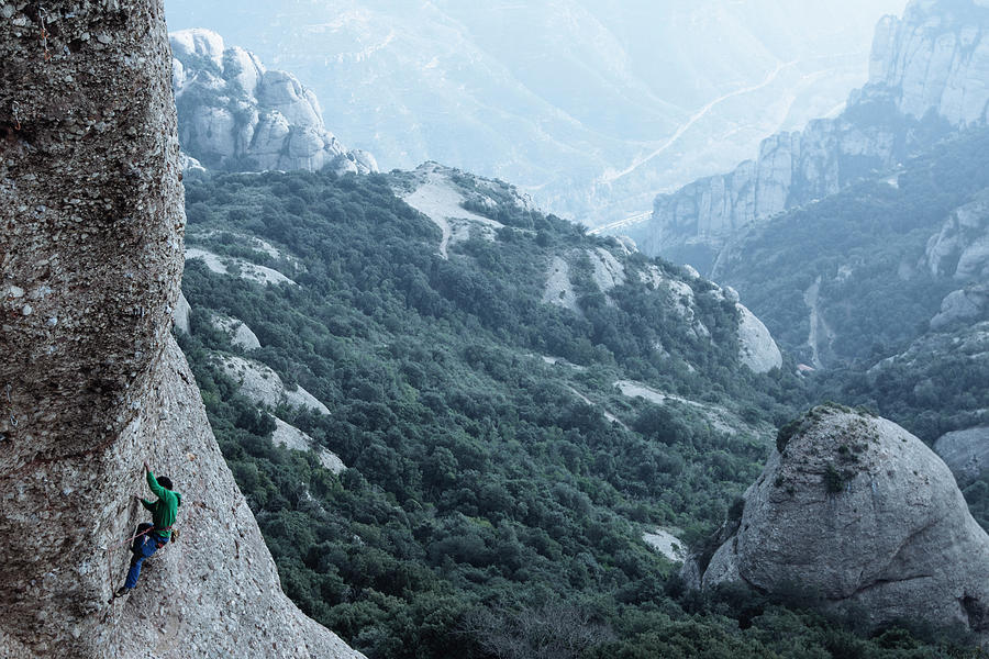 Climber Sending A Difficult Route On Sport Climbing Zone In Montserrat ...