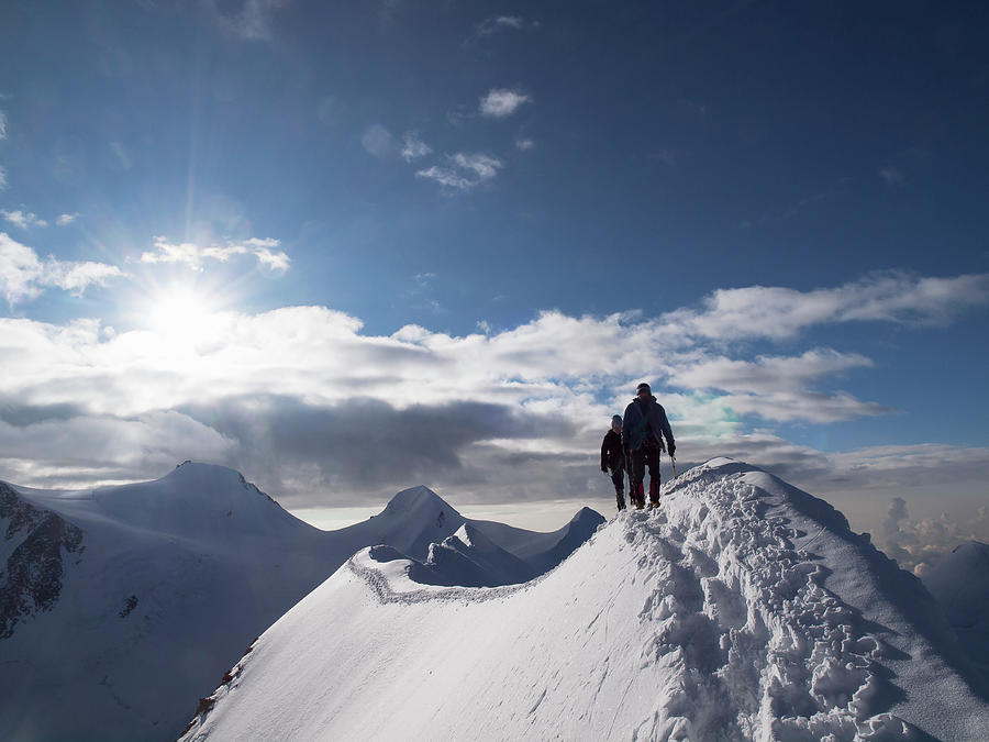 Climbers On A Snowy Ridge Photograph by Buena Vista Images