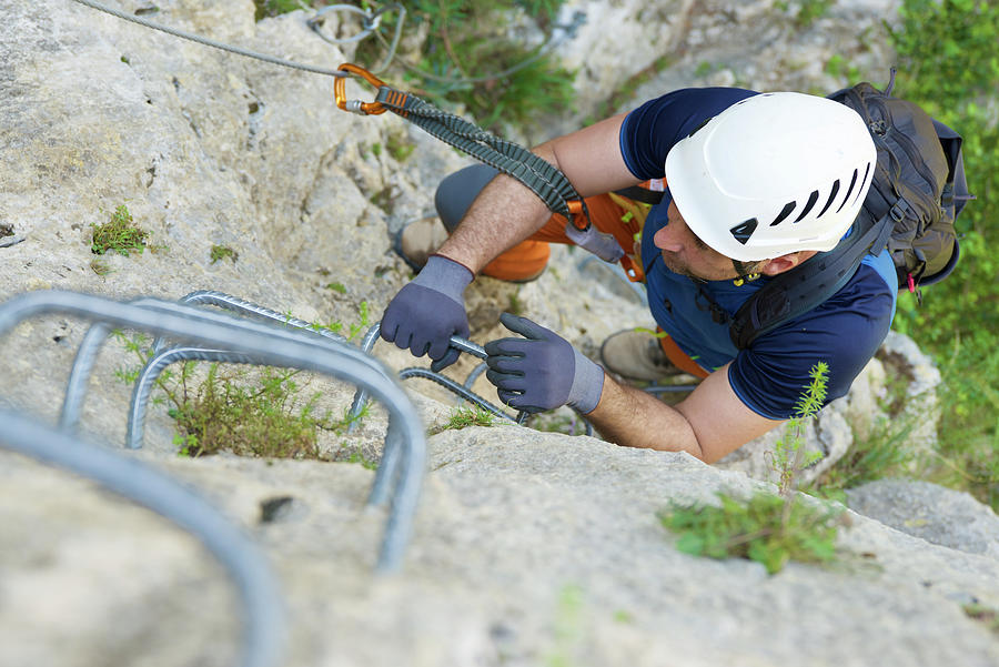 Nature Photograph - Climbing A Ferrata Route In Mascun Ravine In Guara Mountains. by Cavan Images