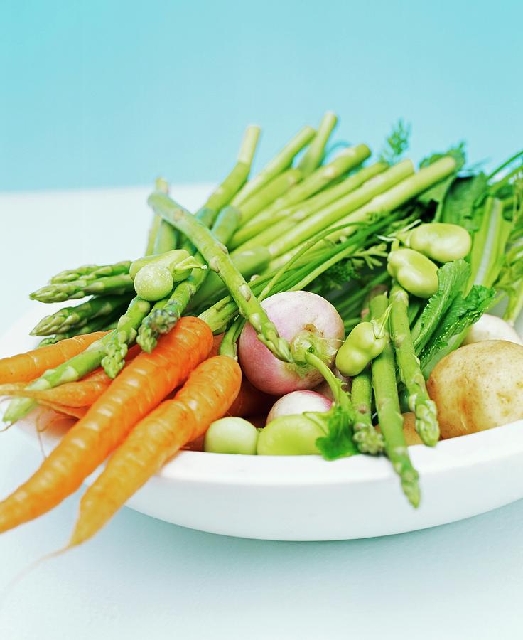 Close Up Of A Bowl Filled With Spring Vegetables Including Carrots, Beans, Asparagus, Turnip And Potatoes Photograph by Burgess, Linda