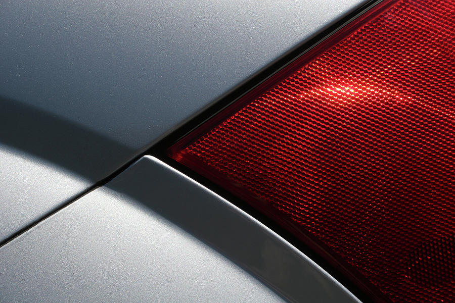 Close Up Of A Tail Light On A Silver Photograph by Penfold