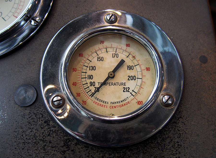 Close Up Of An Old Round Metal Industrial Temperature Gauge Photograph