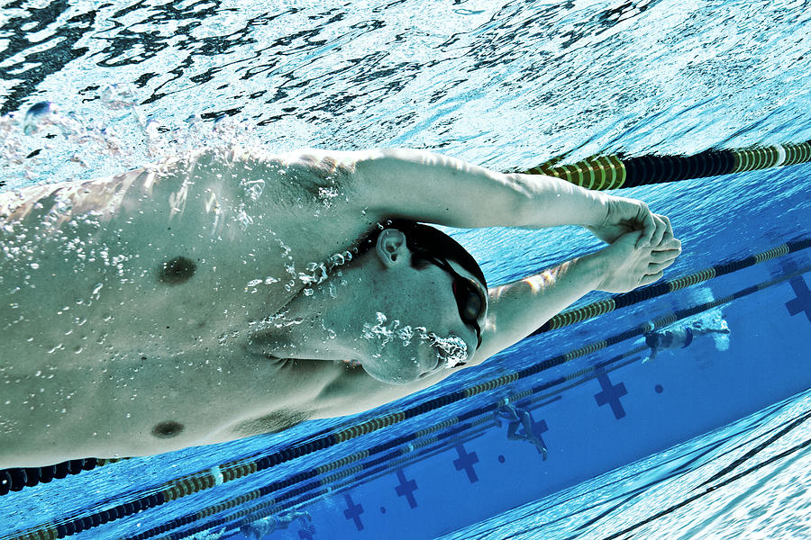 Close-up Of Athlete Swimming In Competition Photograph by Cavan Images ...