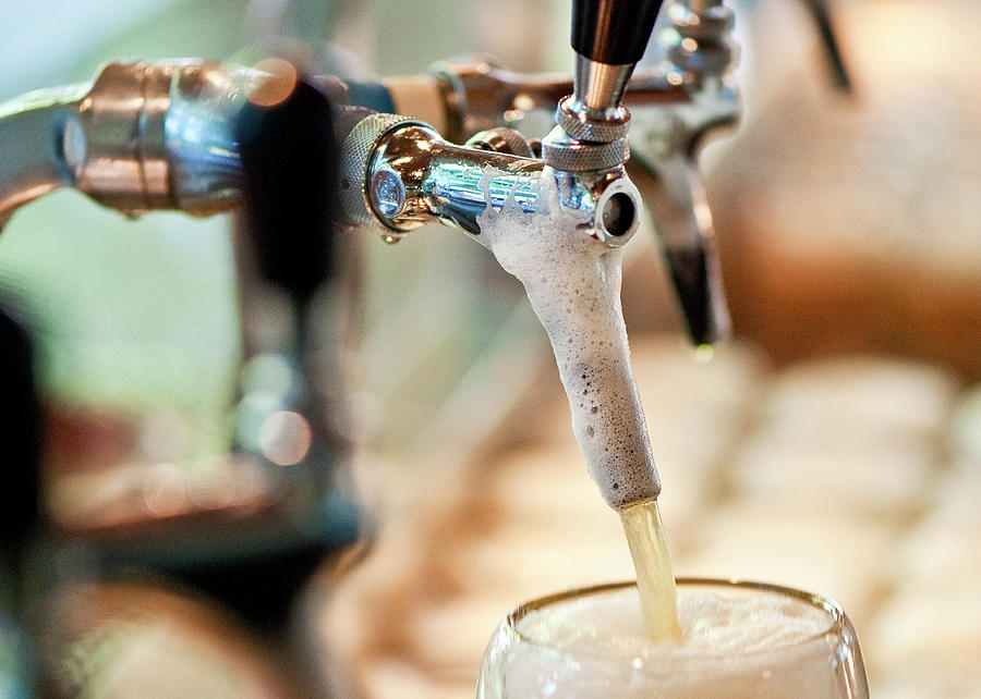Close-up Of Beer Being Tapped In Swiss House, Wiener Prater, Vienna, Austria Photograph by Jalag / Peter Blaha