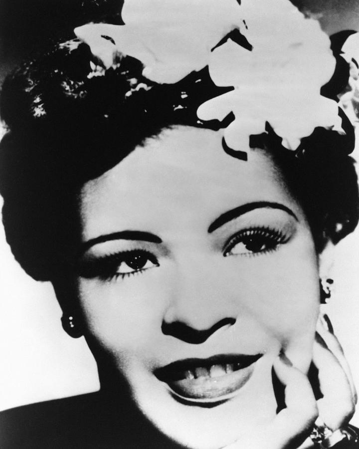 Billie Holiday Photograph - Close-up Of Billie Holiday Smiling With Flower On Hair by Globe Photos