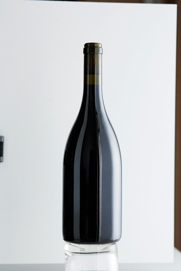 Close Up Of Bottle Of Bordeaux Wine Photograph by Brett Stevens