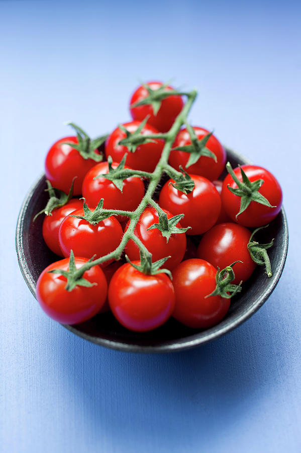 Close Up Of Bowl Of Cherry Tomatoes Photograph by Brigitte Sporrer