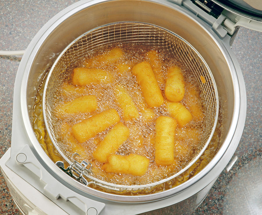 Still Life Photograph - Close-up Of Croquettes In Deep Fryer by Jalag / Uwe Bender