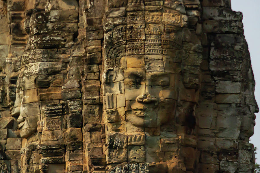 Close up of faces on towers at Bayon Temple in Angkor Tom, Siem  Photograph by Karen Foley
