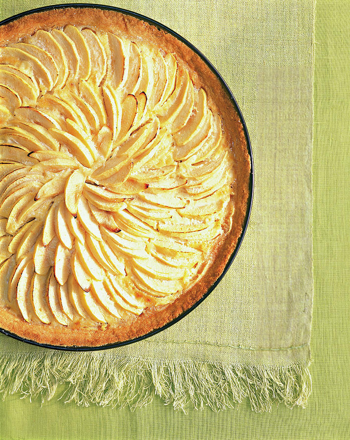 Close-up Of French Apple Tart On Green Background Photograph by Jalag / Jan-peter Westermann