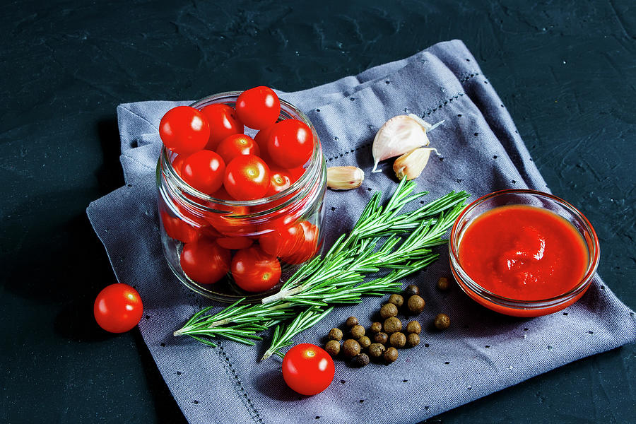Close Up Of Healthy Ingredients For Cooking Cherry Tomato Sauce On Dark Rustic Background Photograph by Yuliya Gontar