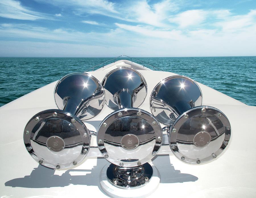 Close-up Of Horns At Yacht Against Cloudy Sky Photograph by Cavan Images Close-up Of Horns At Yacht Against Cloudy Sky Photograph by Cavan Images