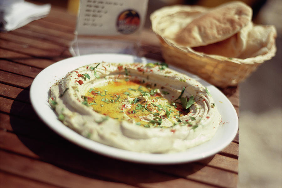 Close Up Of Humus And Pita Bread, Restaurant, Tel Aviv, Israel Photograph by Elan Fleisher