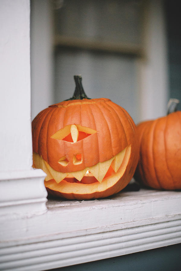 Close-up Of Jack O Lanterns On Retaining Wall Photograph by Cavan ...