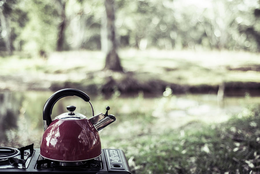 Tree Photograph - Close-up Of Kettle On Camping Stove In Forest by Cavan Images