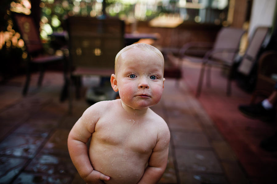 San Diego Photograph - Close Up Of One Year Old Boy Soaking Wet In San Diego by Cavan Images