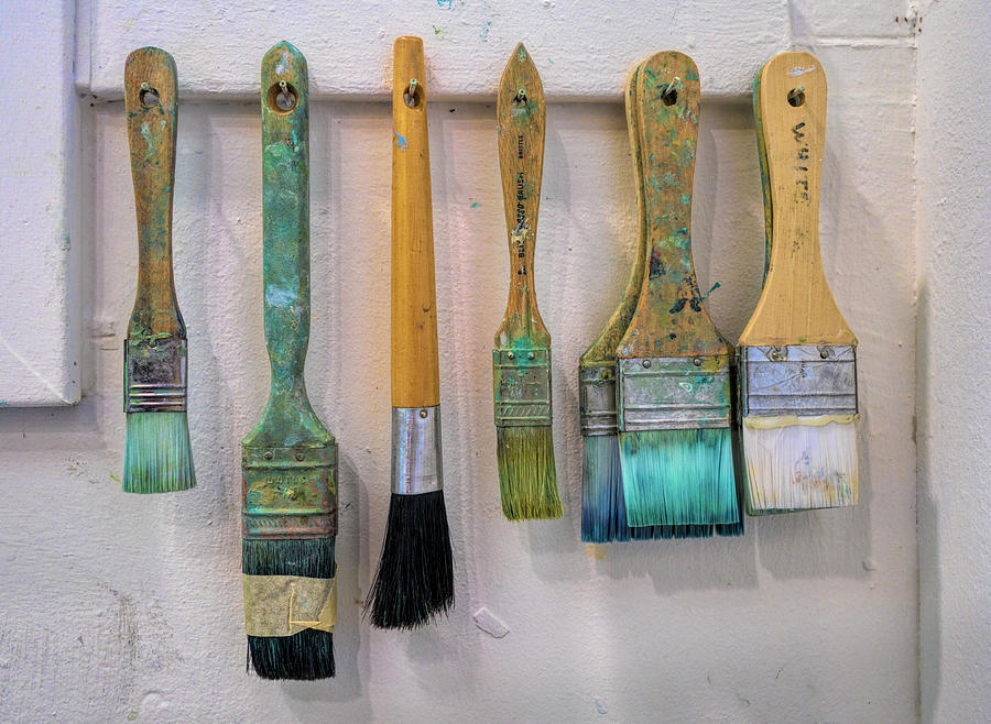 Still Life Photograph - Close-up Of Paint Brushes Hanging by Panoramic Images