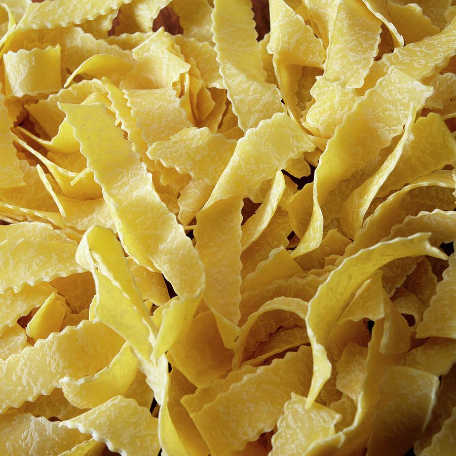 Close Up Of Pasta Nests Of Egg Pappardelle, Reginette Cut Photograph by Paul Poplis