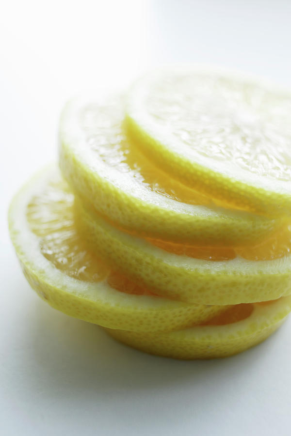 Close Up Of Slices Of Lemon Photograph by Brett Stevens