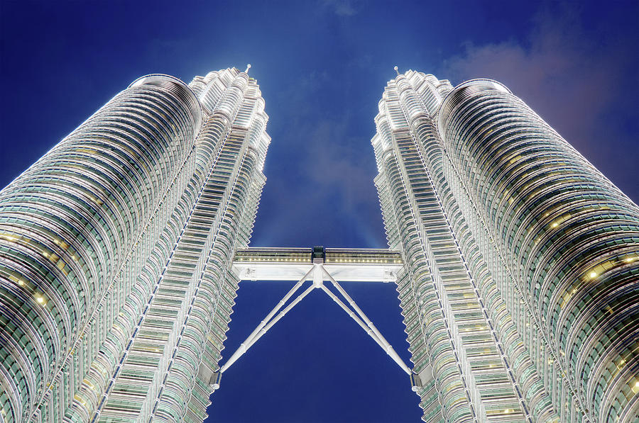 Close-up Of The Petronas Towers Photograph by Tom Bonaventure
