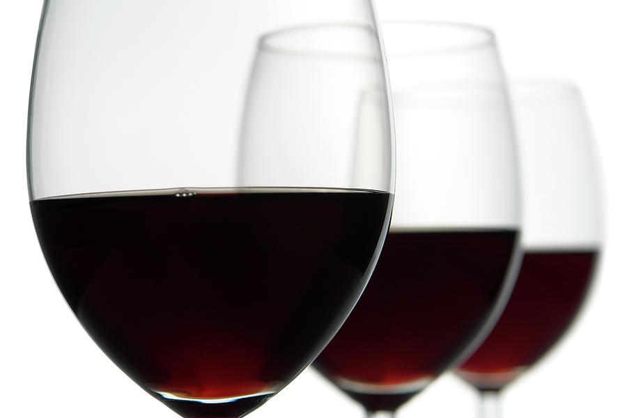 Close-up Of Three Red Wine Glasses by Domin domin