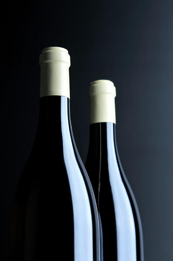 Close-up Of Two Bottles Of Red Wine Photograph by Domin domin