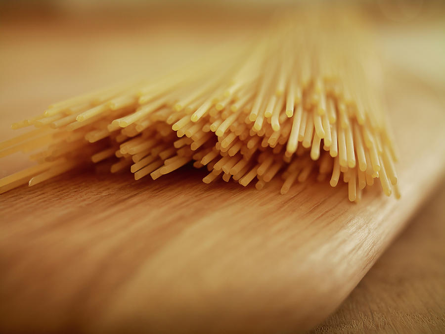 Close Up Of Uncooked Spaghetti Noodles Photograph by Adam Gault