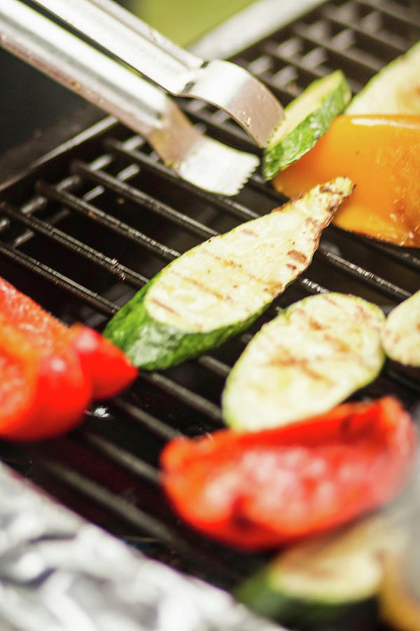 Close Up Of Vegetables Cooking On Grill Photograph by Manuel Sulzer