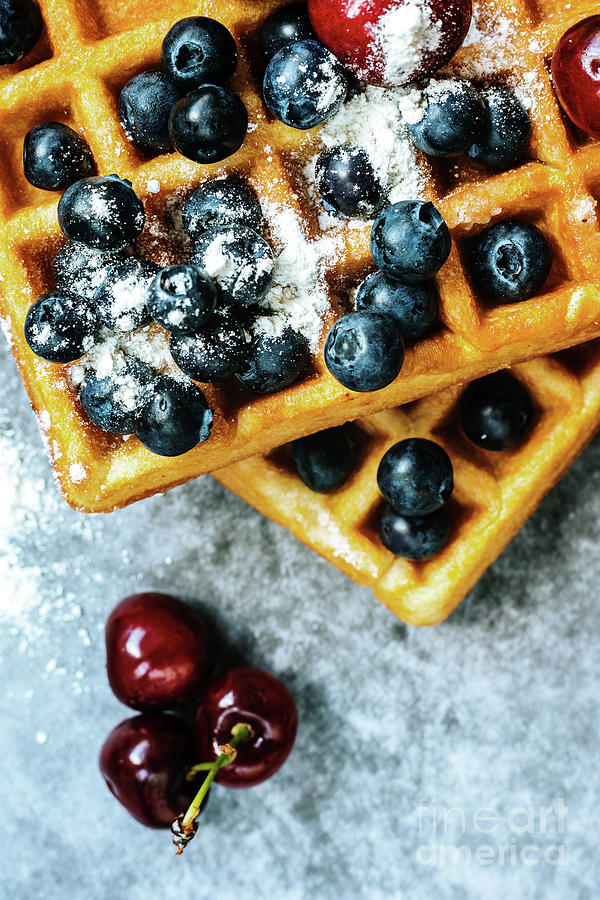 Close-up of waffles with tasty fruits cranberries, cherries and  Photograph by Joaquin Corbalan