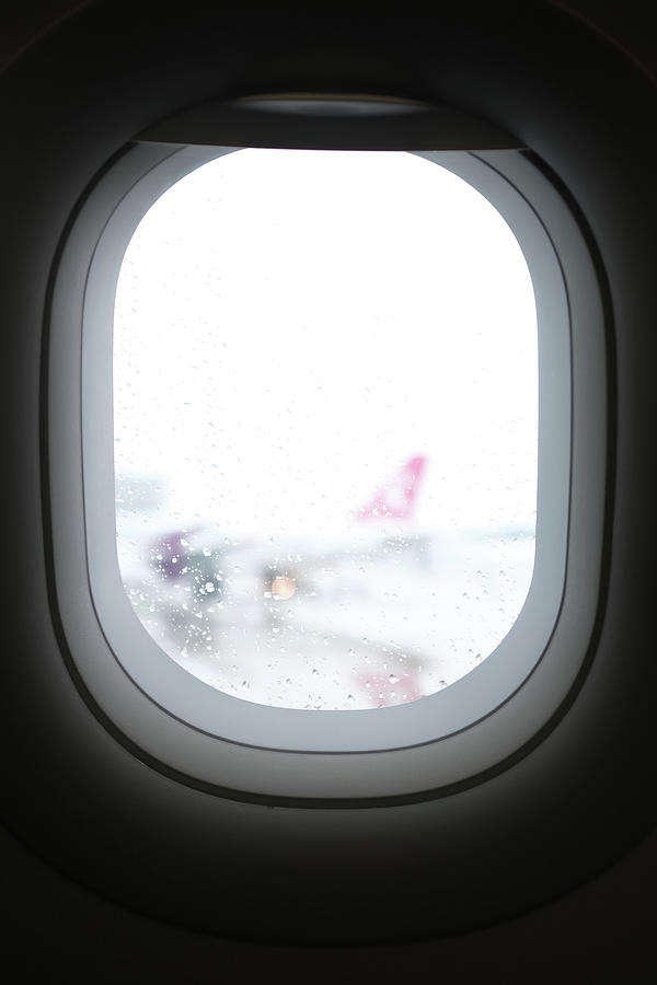 Close-up Of Wet Airplane Window Photograph by Cavan Images - Fine Art ...