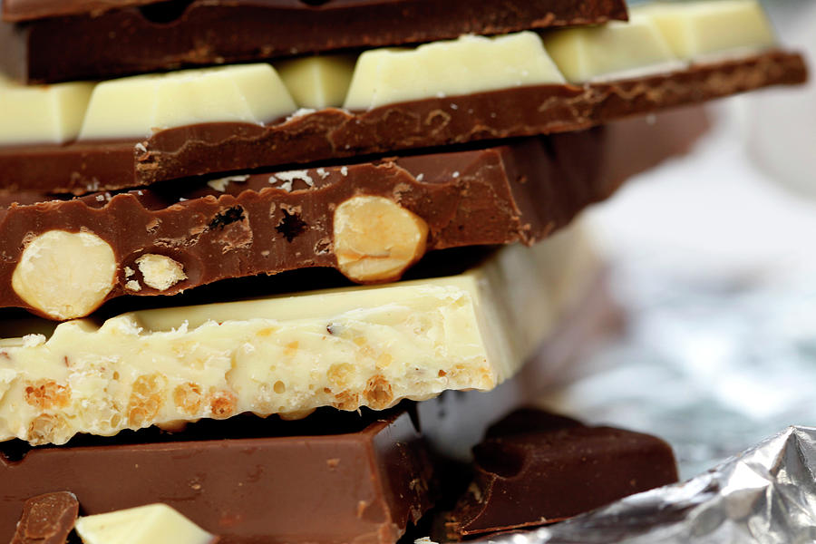 Close-up Of White And Dark Chocolate Bars Photograph by Jalag-fotostudio,