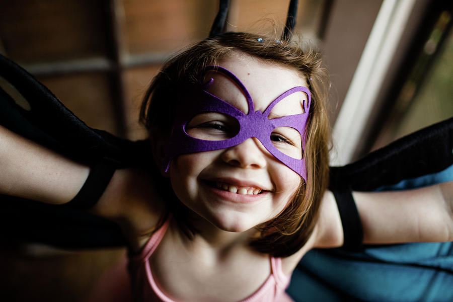 Butterfly Photograph - Close Up Of Young Girl In Dress Up Smiling For Camera by Cavan Images