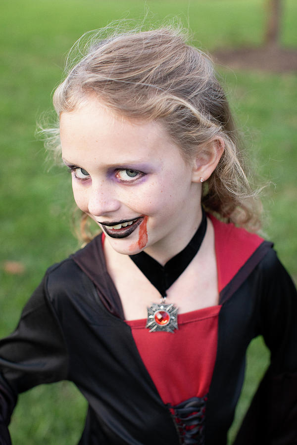 Closeup Of Cute Blonde Girl Dressed In Vampire Halloween Costume ...