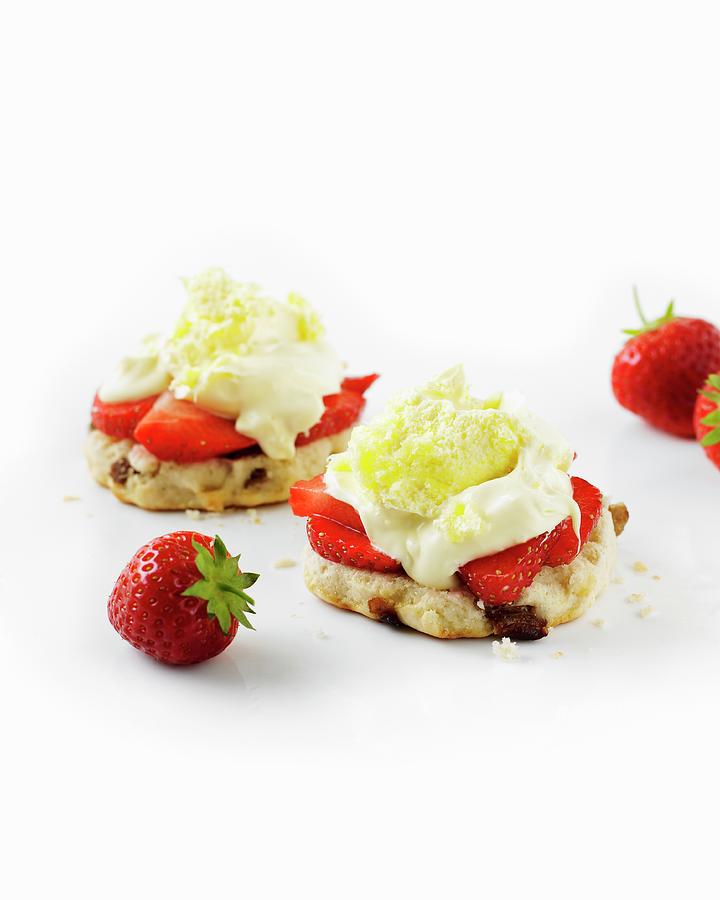 Clotted Cream And Strawberries On Scones Photograph by Charlie Richards