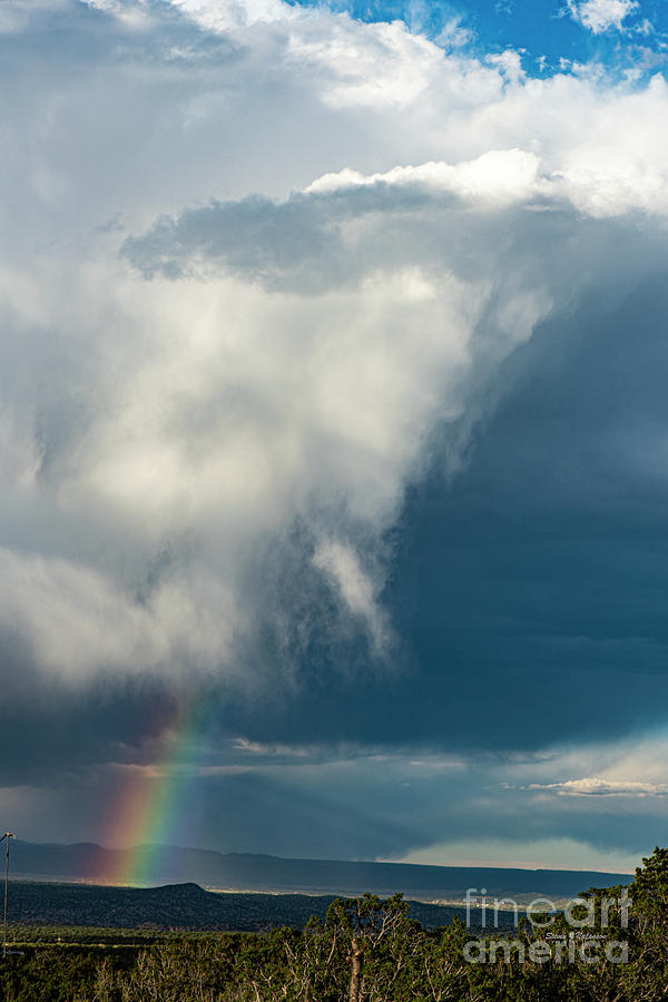 Cloud Burst with Rainbow Photograph by Steven Natanson