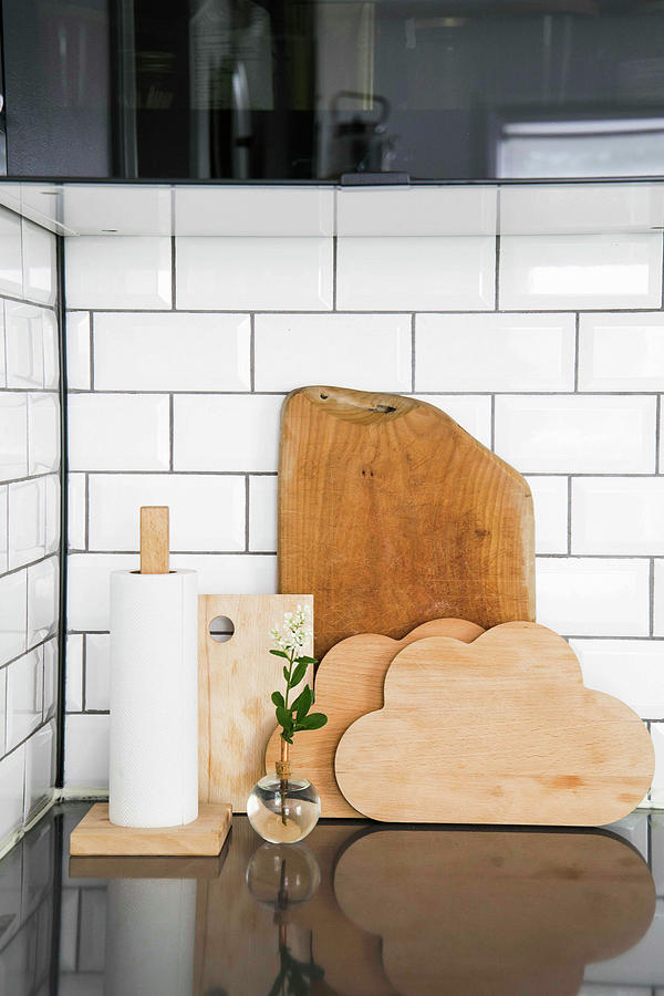 Cloud-shaped Chopping Boards And Kitchen Roll On Simple Holdeer Photograph by Ilaria Chiaratti