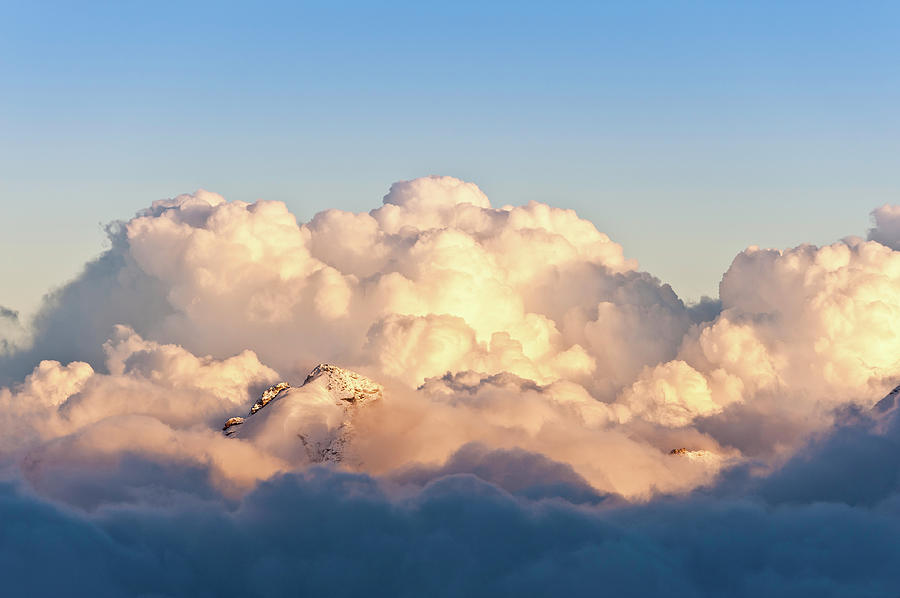 Cloud Summit Sunset Golden Light On Photograph by Fotovoyager