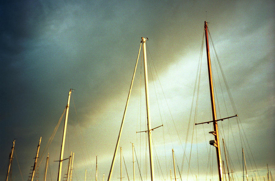 Clouds & Masts Photograph by Laura A. Watt