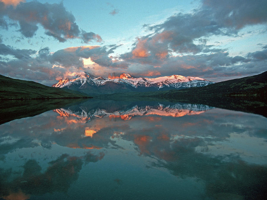 Clouds And Mountains Reflecting In The Photograph by Mountlynx