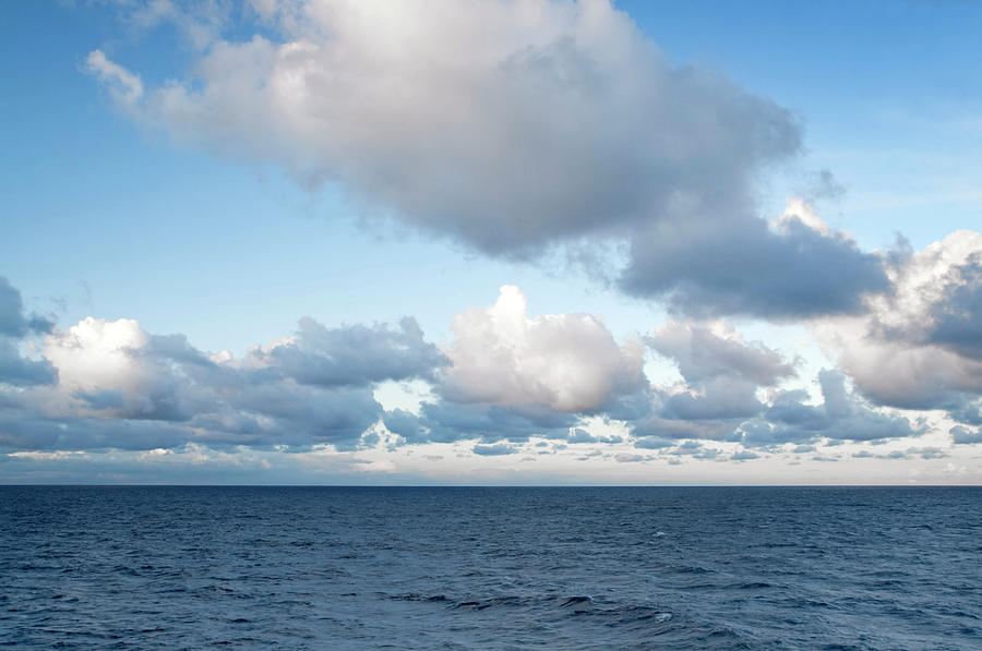 Clouds At Sea Photograph by Lordrunar