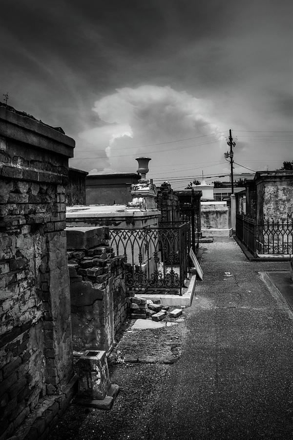 Clouds Behind Graves In Black and White Photograph by Greg and Chrystal Mimbs