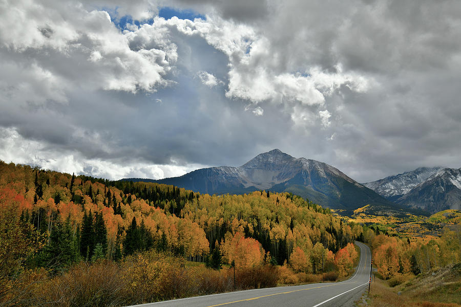 Clouds Break Over Fall Colors Along Highway 145 Photograph by Ray Mathis