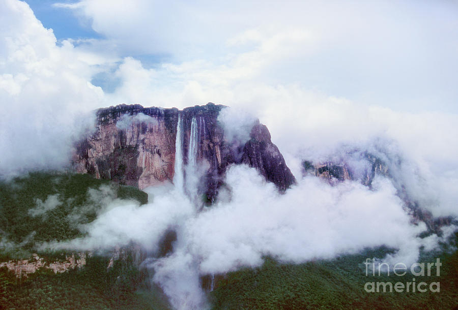 Clouds Cover Angel Falls In Canaima Np Venezuela Photograph by Dave Welling