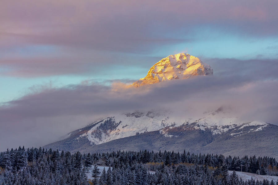 Cloud Photograph - Clouds Envelope Crowsnest Mountain by Chuck Haney