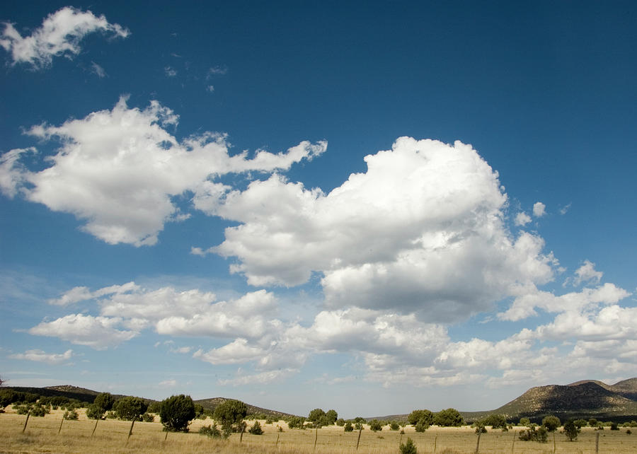 Clouds On Blue Texas Sky Photograph by Pacoromero
