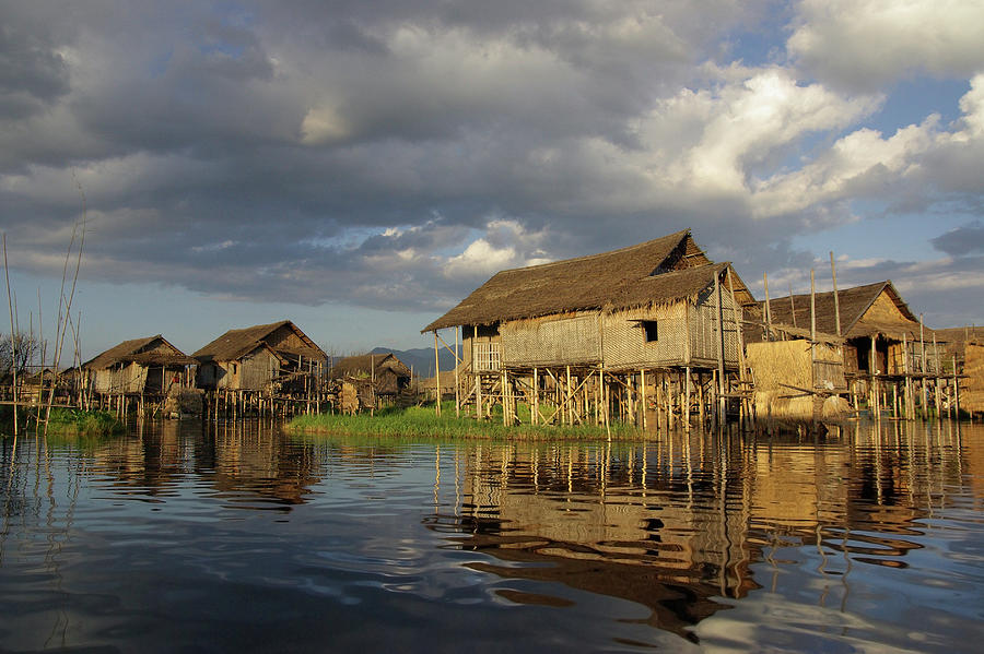 Clouds Over Floating Village Photograph by Peru Serra