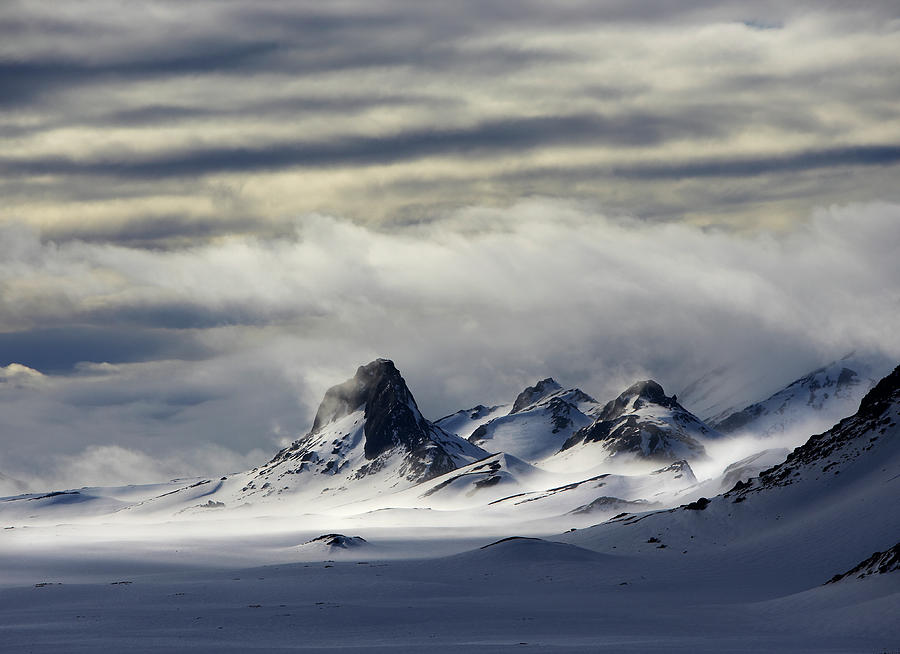 Clouds Over Snow Covered Mountain Peeks by Arctic-images