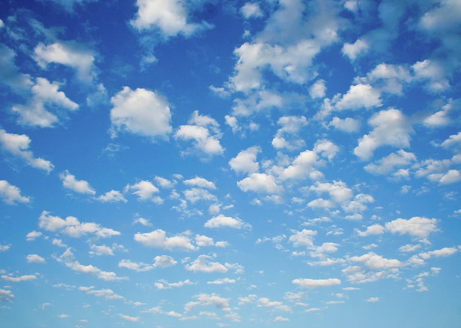 Clouds Point Toward The Horizon By Photo By Brian T. Evans