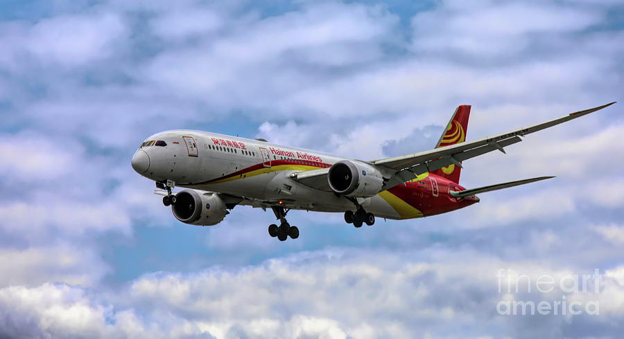 Clouds Surround Hainan Airlines  Photograph by Chuck Kuhn